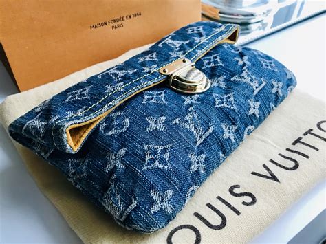 lv denim clutch|Louis Vuitton backpack clutch.